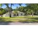 Charming single-story home with a well-kept lawn and mature trees at 1523 Red Plum Holw, Deland, FL 32720