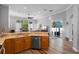 Well-lit kitchen featuring wooden cabinets, stainless steel appliances, and an open layout at 1523 Red Plum Holw, Deland, FL 32720