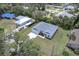 A lovely new home with long driveway amid mature trees in a tranquil residential neighborhood at 156 N Cory Dr, Edgewater, FL 32141