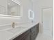 Modern bathroom with double sinks, white countertops, and recessed lighting for a sleek feel at 156 N Cory Dr, Edgewater, FL 32141