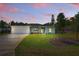 Charming single story home with a well-manicured lawn and neutral paint at 156 N Cory Dr, Edgewater, FL 32141
