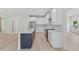 Modern kitchen with an island, stainless steel appliances and updated cabinetry at 156 N Cory Dr, Edgewater, FL 32141