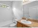 Bathroom features a shower, toilet, and vanity at 15733 Green Point Ct, Clermont, FL 34714