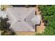 Aerial view of a home's roof showing architectural details and composition at 15733 Green Point Ct, Clermont, FL 34714