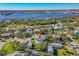 An aerial view illustrating the property's location near a waterway and other waterfront homes at 1613 Crescent Ridge Rd, Daytona Beach, FL 32118