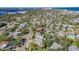 A serene aerial view of the property nestled within a neighborhood, highlighting community access at 1613 Crescent Ridge Rd, Daytona Beach, FL 32118