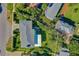 An aerial view showing the property lines of a well-maintained home and its surrounding yard at 1613 Crescent Ridge Rd, Daytona Beach, FL 32118