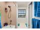 Bathroom with a shower and window at 1613 Crescent Ridge Rd, Daytona Beach, FL 32118