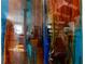 View through an ornate, translucent bathroom door, offering a glimpse of the stylish interior at 1613 Crescent Ridge Rd, Daytona Beach, FL 32118