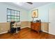 Bedroom featuring a desk and natural light from the window at 1613 Crescent Ridge Rd, Daytona Beach, FL 32118