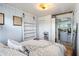 Charming bedroom with wood floors and view to kitchen at 1613 Crescent Ridge Rd, Daytona Beach, FL 32118