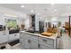 Spacious kitchen features light grey cabinets and stainless steel appliances at 1613 Crescent Ridge Rd, Daytona Beach, FL 32118
