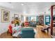 Stylish living area with hardwood floors, fireplace, and unique decor that flows through the house at 1613 Crescent Ridge Rd, Daytona Beach, FL 32118