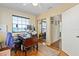 Office with hardwood floors, built-in closet, and a window for natural light at 1613 Crescent Ridge Rd, Daytona Beach, FL 32118