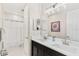 Bathroom featuring double sinks, shower, and toilet at 163 Rosa Bella Vw, Debary, FL 32713