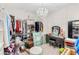 Walk-in closet featuring a chandelier, vanity, and lots of clothing storage at 163 Rosa Bella Vw, Debary, FL 32713