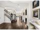Inviting entryway with hardwood floors, staircase, white trim, and stylish decorative accents at 163 Rosa Bella Vw, Debary, FL 32713
