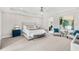 Spacious main bedroom features tray ceiling, soft carpet, and an ensuite bathroom at 163 Rosa Bella Vw, Debary, FL 32713