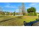 Scenic community pond surrounded by lush greenery, offering a tranquil view and a peaceful retreat at 163 Rosa Bella Vw, Debary, FL 32713