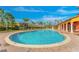 Large community swimming pool and sundeck with lounge chairs, perfect for relaxation and recreation at 163 Rosa Bella Vw, Debary, FL 32713