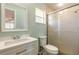 Bathroom showcasing modern vanity, commode and walk-in shower with glass door at 1650 Jacobs Rd, South Daytona, FL 32119