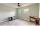 Bedroom with wood-look tile flooring, closet, neutral paint and a ceiling fan at 1650 Jacobs Rd, South Daytona, FL 32119