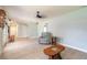 Comfortable living room featuring tile floors and neutral color scheme at 1650 Jacobs Rd, South Daytona, FL 32119