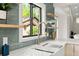 Beautiful Kitchen featuring floating shelves, undermount sink, stylish backsplash at 1841 Spruce Creek Blvd, Port Orange, FL 32128
