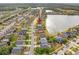 Aerial view of a residential neighborhood, the house is indicated by an arrow and features a lake view at 1929 Cove Point Rd, Port Orange, FL 32128