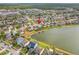 Neighborhood aerial shot indicates location of home, a lake view home with mature trees at 1929 Cove Point Rd, Port Orange, FL 32128