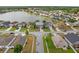 Aerial view of a Gathering friendly neighborhood featuring a quiet lake at 1929 Cove Point Rd, Port Orange, FL 32128