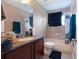 The bathroom features a granite vanity and a shower-tub combination at 1929 Cove Point Rd, Port Orange, FL 32128
