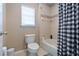 Bathroom features a toilet and shower/tub combo at 1929 Cove Point Rd, Port Orange, FL 32128