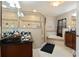 The bathroom boasts a glass-enclosed shower, soaking tub, and dual vanities with granite countertops at 1929 Cove Point Rd, Port Orange, FL 32128