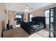 Spacious bedroom with a ceiling fan and large windows that provide ample natural light at 1929 Cove Point Rd, Port Orange, FL 32128