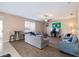 Bright and airy living room featuring sleek hard-surface flooring and neutral paint at 1929 Cove Point Rd, Port Orange, FL 32128
