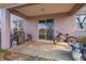 Patio with grill, a bike, and lake view at 1929 Cove Point Rd, Port Orange, FL 32128