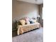 Bedroom featuring a daybed with colorful pillows and a ceiling fan at 201 Asterbrooke Dr, Deland, FL 32724