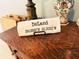 Unique DeLand decor on wooden dresser at 201 Asterbrooke Dr, Deland, FL 32724