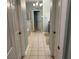 Hallway featuring access to bedrooms and the bathroom at 201 Asterbrooke Dr, Deland, FL 32724