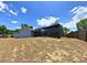 House featuring a backyard and screened in pool at 206 Westmoor Bnd, Orlando, FL 32835