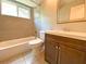 Updated bathroom with tiled walls, a modern vanity, and a bathtub-shower combination at 206 Westmoor Bnd, Orlando, FL 32835