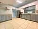 Spacious kitchen with stainless steel appliances, granite countertops, and ample cabinet space at 206 Westmoor Bnd, Orlando, FL 32835