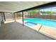 Enclosed swimming pool with spa, plus a patio area for relaxing and entertaining at 206 Westmoor Bnd, Orlando, FL 32835