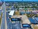 Real estate picture showcasing the beach, roads, a parking lot, and a commercial building at 2101 N Atlantic Ave # 10, Daytona Beach, FL 32118