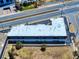 Aerial of commercial building with parking, sparse landscaping and proximity to nearby roads at 2101 N Atlantic Ave # 10, Daytona Beach, FL 32118