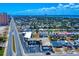 Aerial of an extensive commercial area with buildings, roads, parking, and some landscaping at 2101 N Atlantic Ave # 10, Daytona Beach, FL 32118