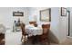 Bright dining area showcasing a round table with wooden chairs and decorative accents at 2101 N Atlantic Ave # 10, Daytona Beach, FL 32118