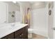 Bathroom featuring vanity, mirror, shower, and toilet at 220 Asterbrooke Dr, Deland, FL 32724