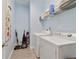 Bright laundry room with side-by-side washer and dryer at 220 Asterbrooke Dr, Deland, FL 32724
